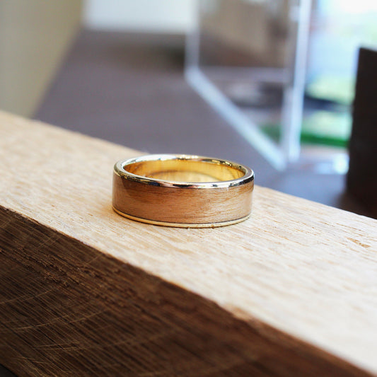 gold ring with cherry wood inlay 