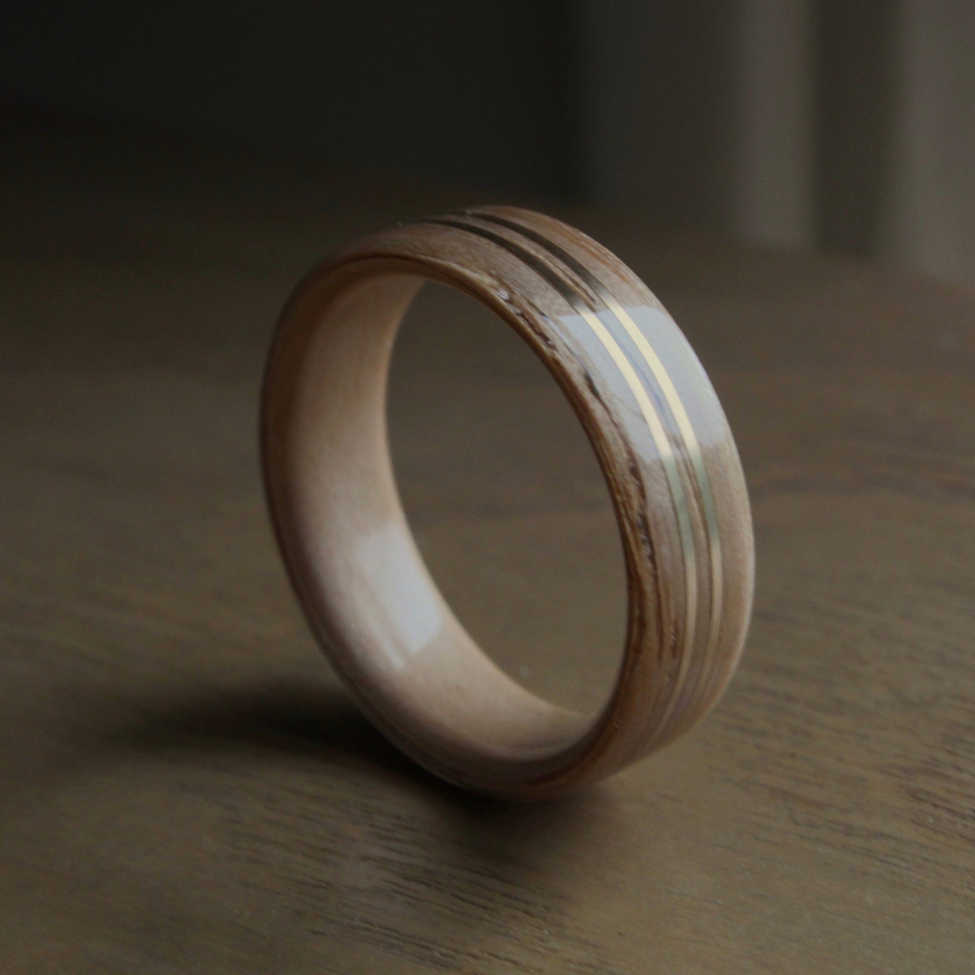 Wood ring with gold inlay