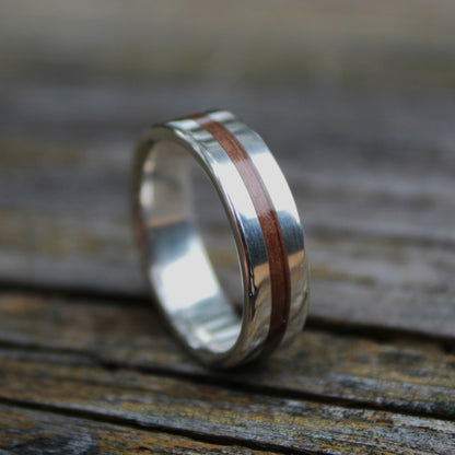 Silver ring with walnut