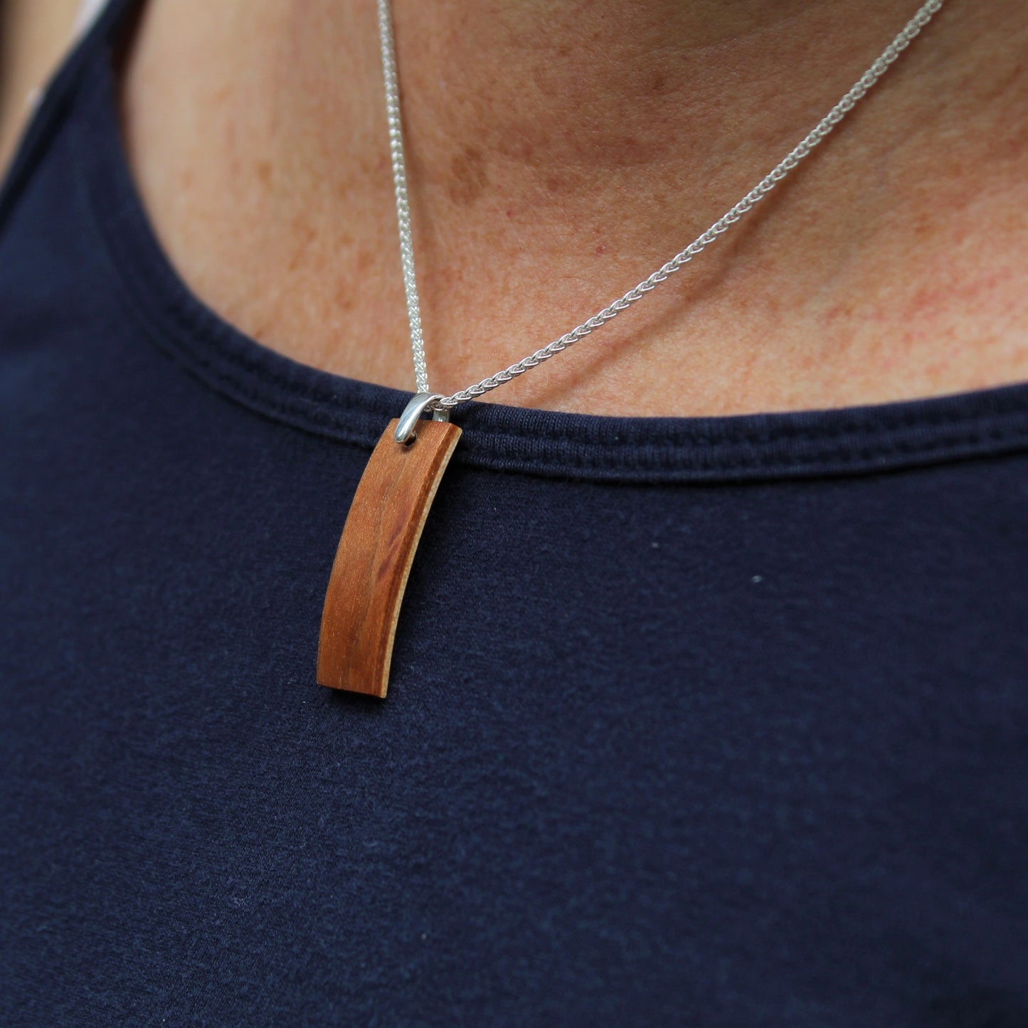 Cherry wood pendant with silver chain