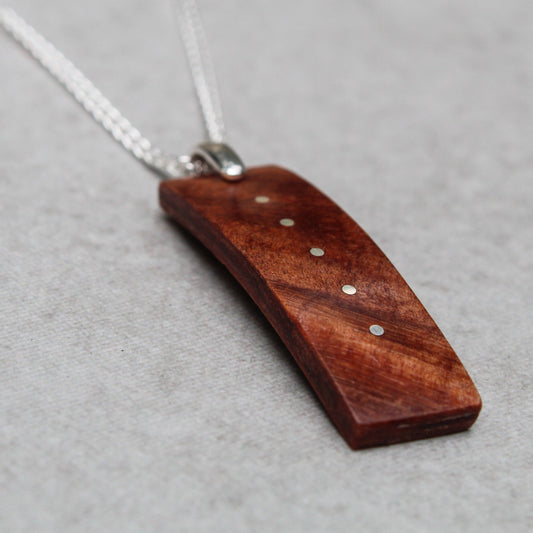 Arced Redwood and Silver Inlaid Pendant